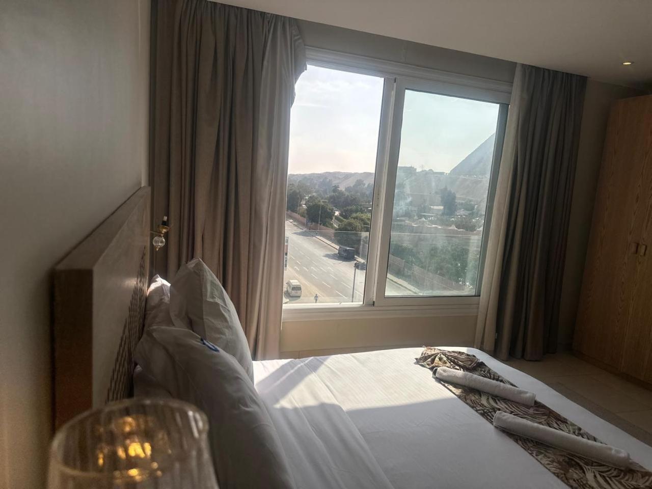 Doudou Pyramids View Hotel Kafret el-Gabal Extérieur photo