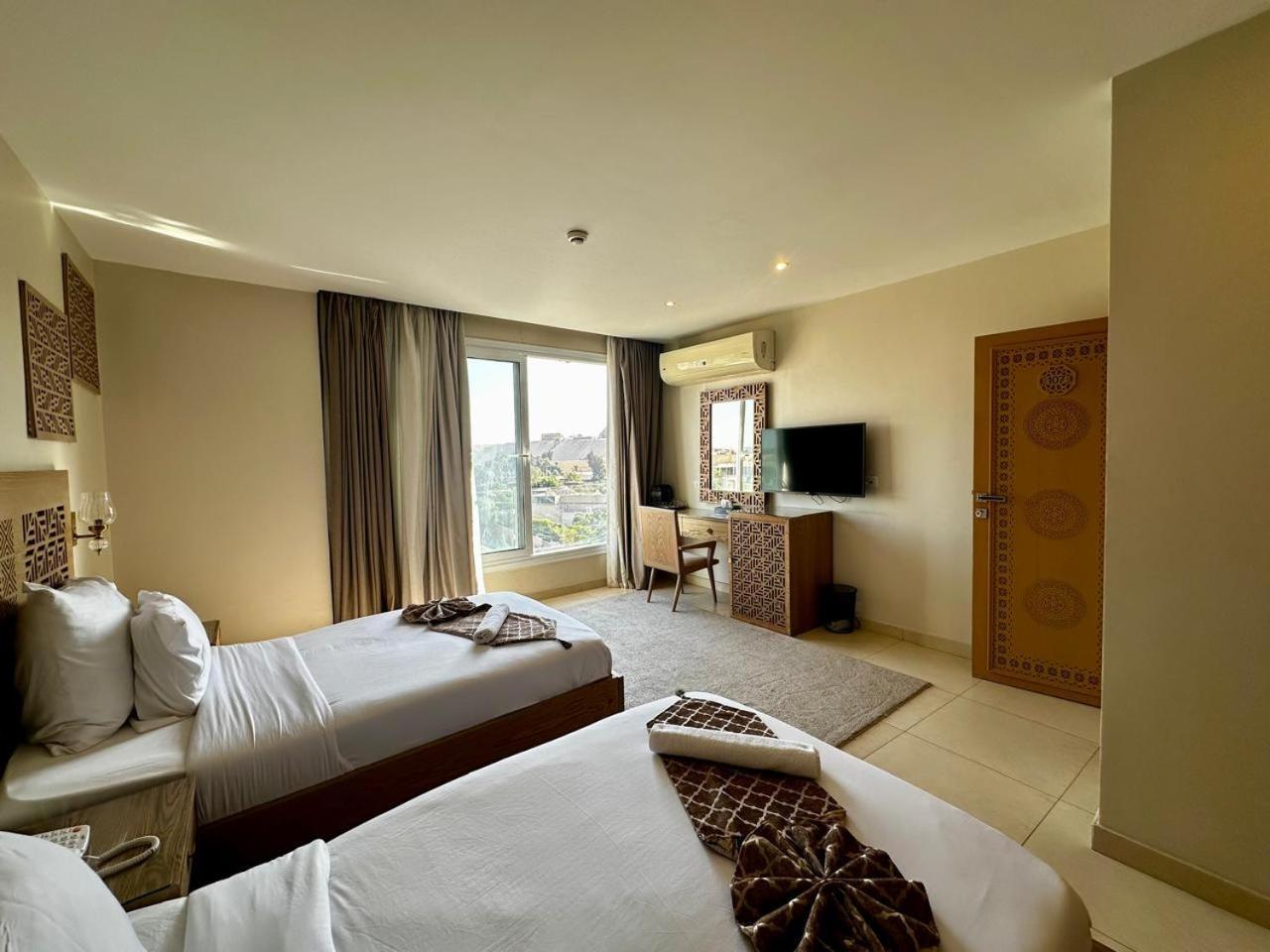 Doudou Pyramids View Hotel Kafret el-Gabal Extérieur photo
