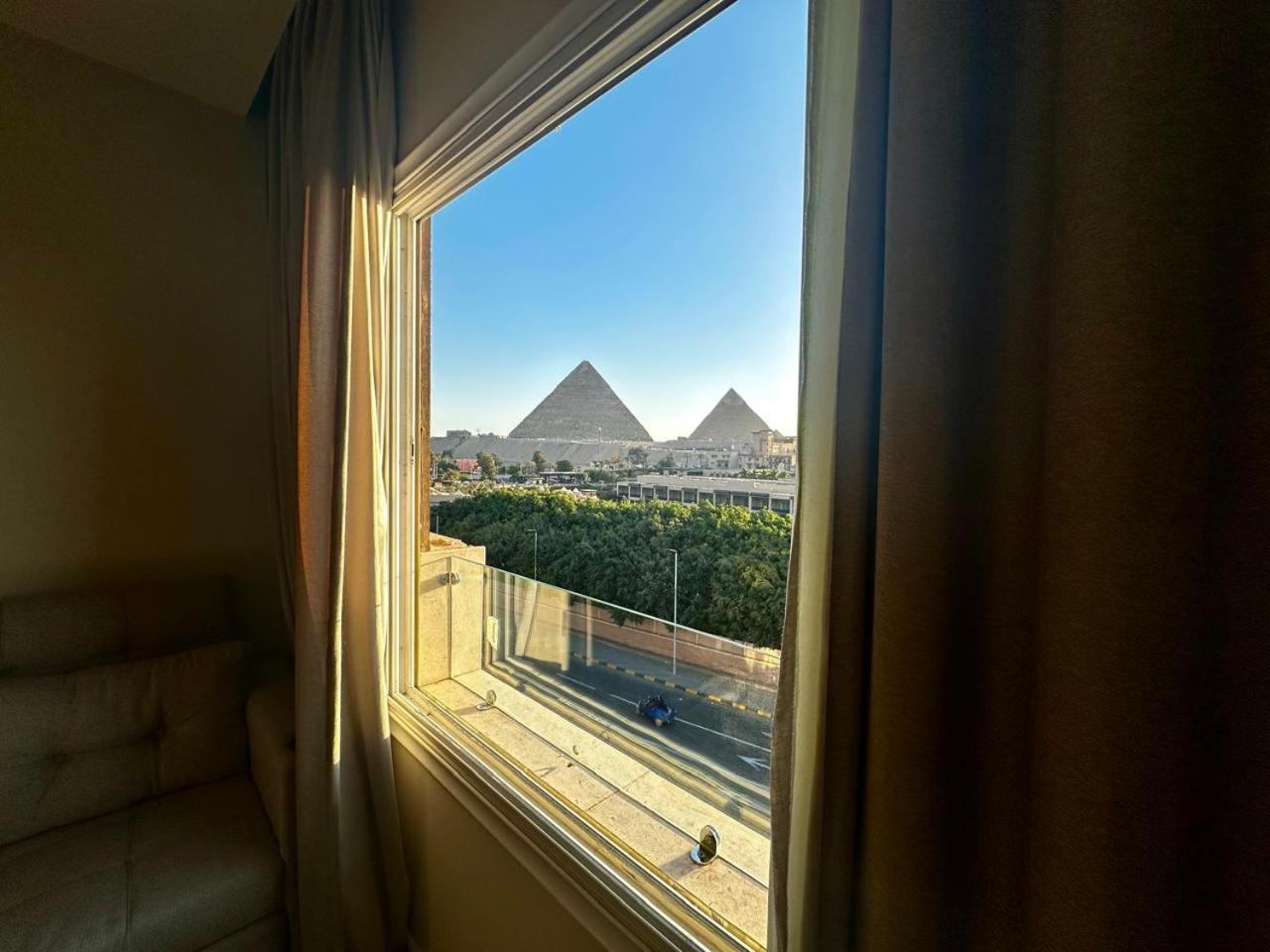 Doudou Pyramids View Hotel Kafret el-Gabal Extérieur photo
